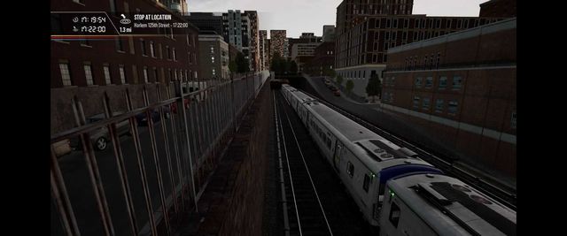 An overhead view of a simulated Metro-North train on the Harlem Line featured in a video game.